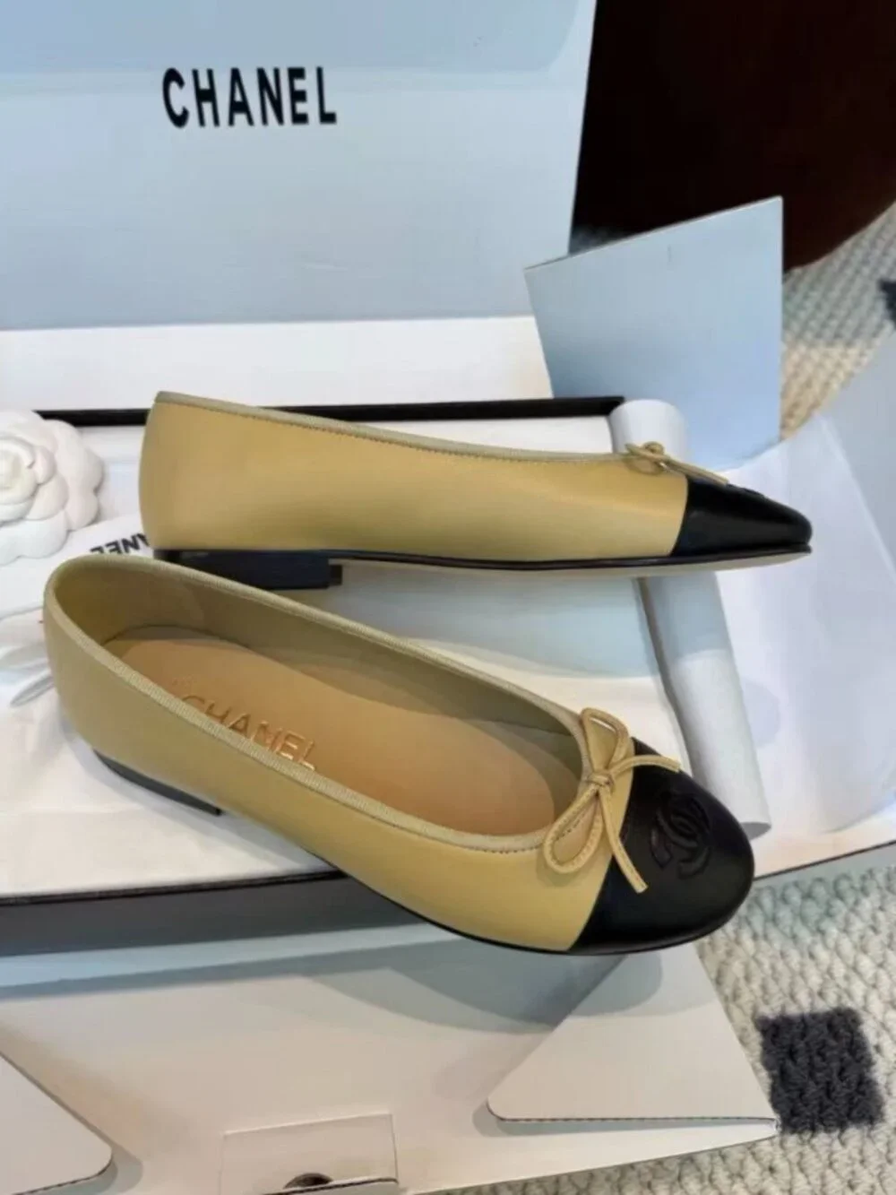 CHANEL Two-Tone Leather Embossed CC Bow Round Toe Ballet Flats